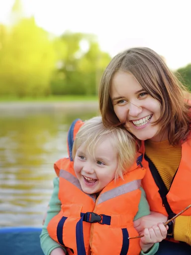 Woman and child with lifevests