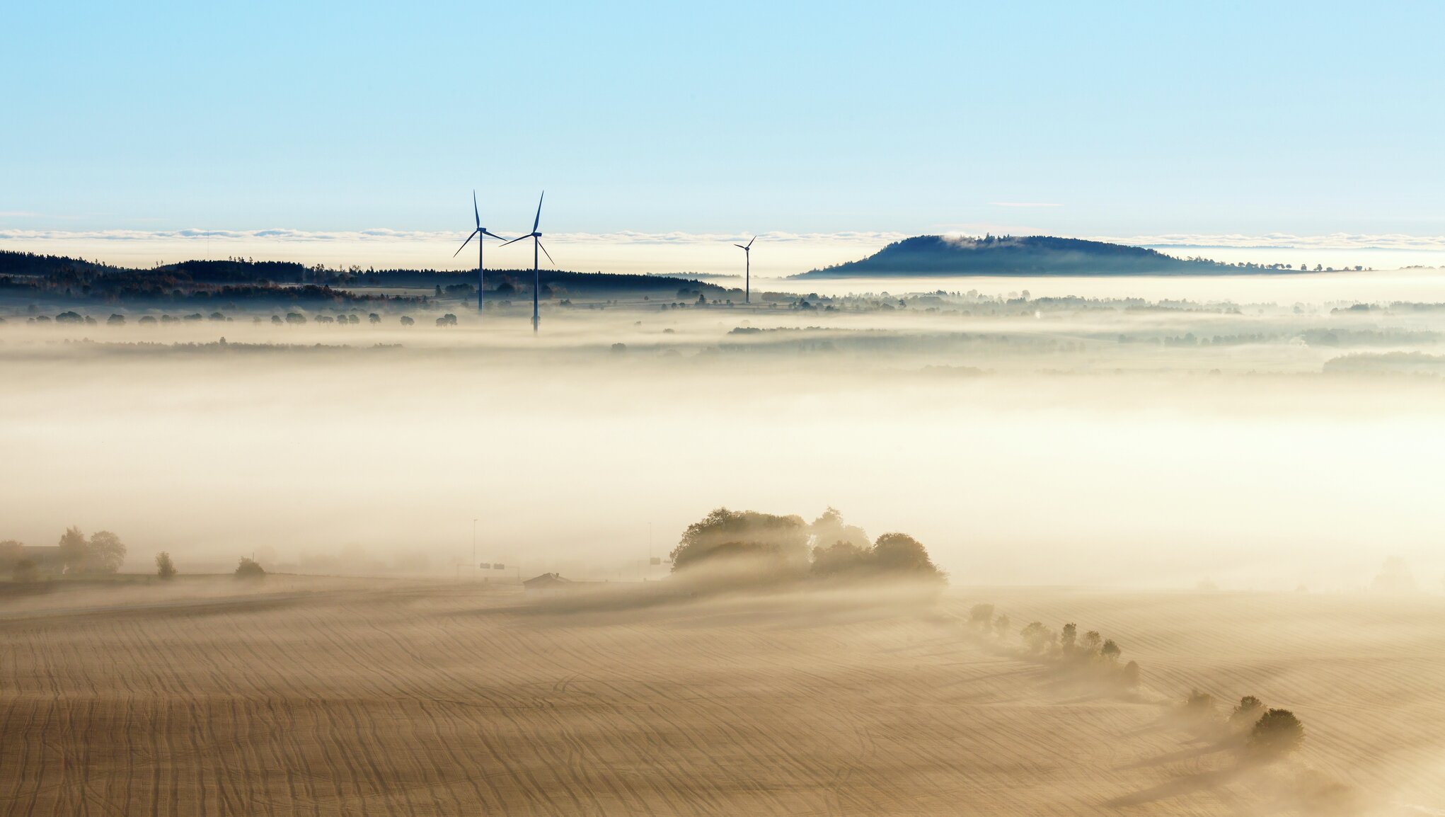 windmills in desert.