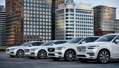 Volvo S90, V90, XC60 og XC90 recharge parkert på parkeringsplass i storby