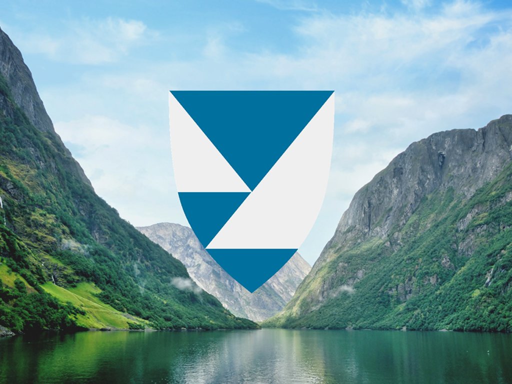 Nytt fylkesvåpen illustrert med fjord og fjell i bakgrunnen