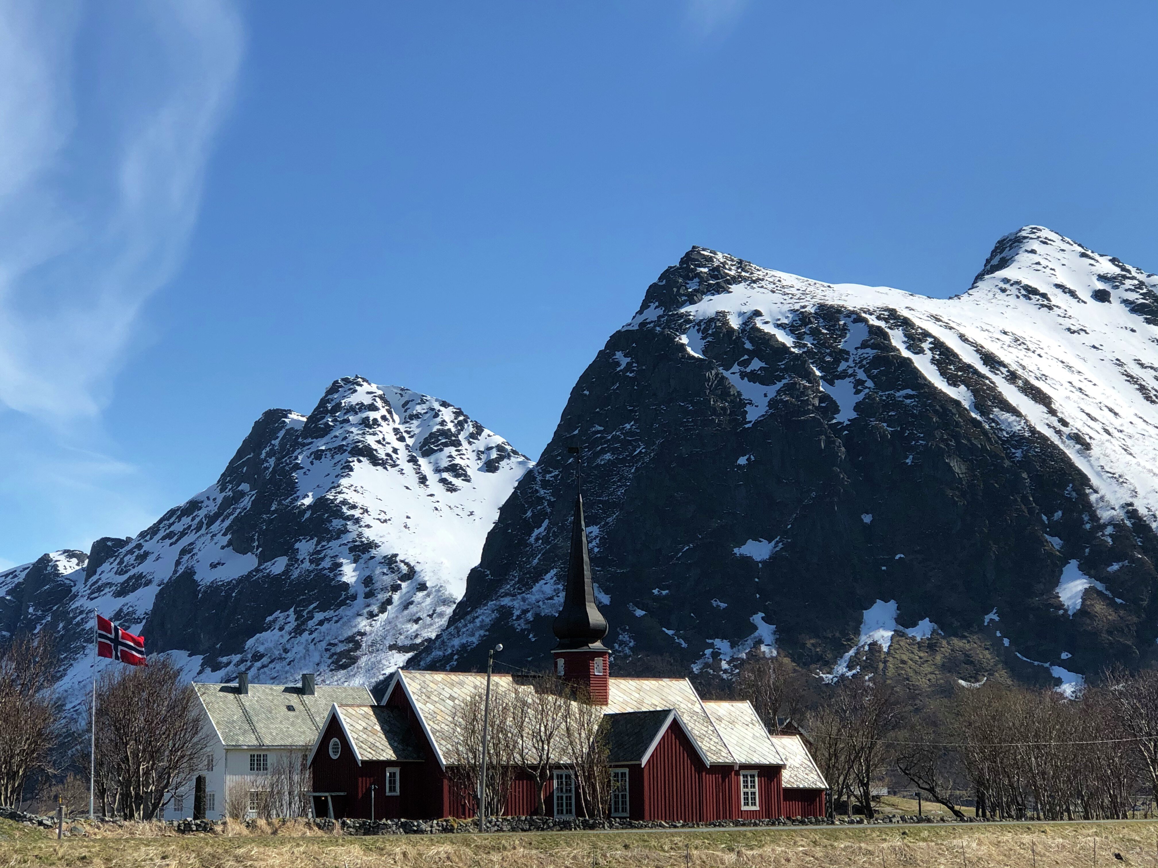 Flakstad Church on the day with snow